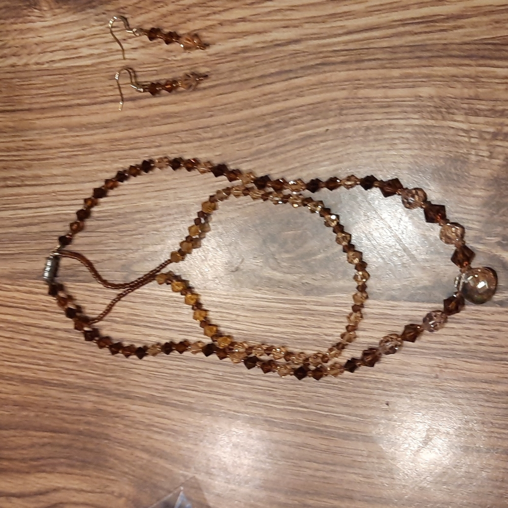 Swarovski crystal brown necklace and earrings set.